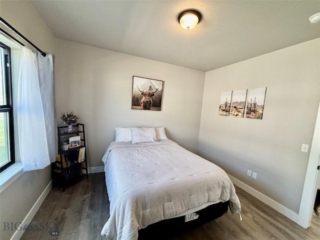 165 Johnson Ave, Dillon, MT 59725 - bedroom featuring wood finished floors and baseboards