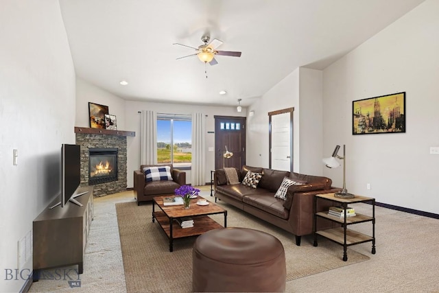 343 Stewart Loop, Bozeman, MT 59718 - carpeted living area featuring ceiling fan and a stone fireplace