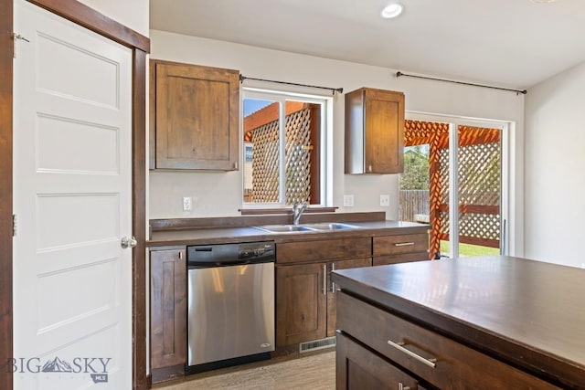 343 Stewart Loop, Bozeman, MT 59718 - kitchen featuring dishwasher, dark countertops, light wood-style flooring, recessed lighting, and brown cabinets