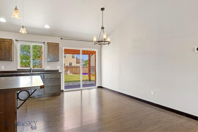 343 Stewart Loop, Bozeman, MT 59718 - unfurnished dining area featuring dark wood-style floors, a chandelier, and recessed lighting