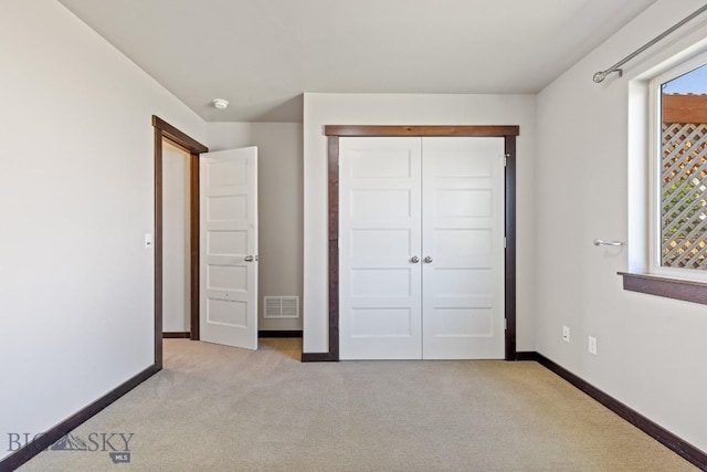 343 Stewart Loop, Bozeman, MT 59718 - unfurnished bedroom with light carpet and a closet