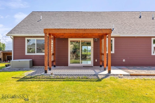 343 Stewart Loop, Bozeman, MT 59718 - back of property featuring a lawn, a patio, and a shingled roof