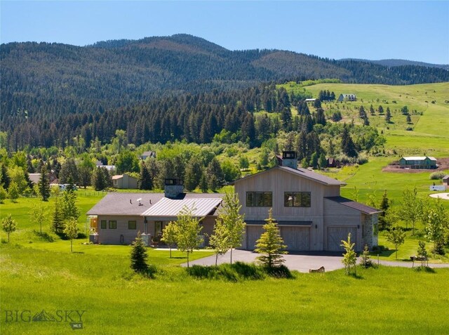75 Vera Ct, Bozeman, MT 59718 - view from above of property with a forest and a mountain backdrop