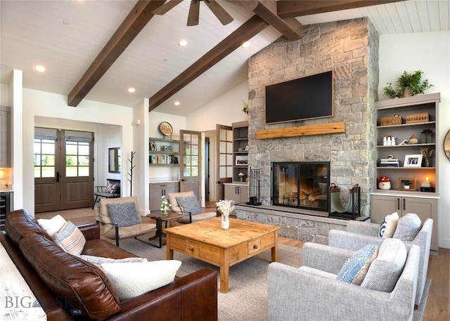 75 Vera Ct, Bozeman, MT 59718 - living area featuring wood finished floors, a fireplace, ceiling fan, and recessed lighting