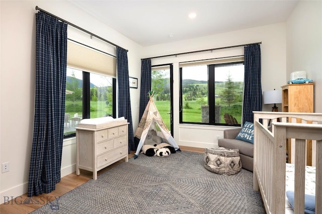 75 Vera Ct, Bozeman, MT 59718 - bedroom featuring baseboards and wood finished floors