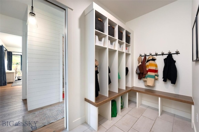 75 Vera Ct, Bozeman, MT 59718 - mudroom featuring tile patterned floors and baseboards