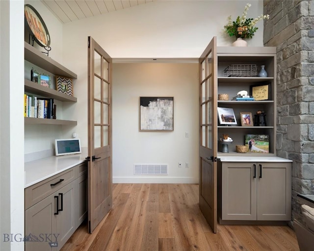 75 Vera Ct, Bozeman, MT 59718 - office area featuring light wood-type flooring, french doors, and lofted ceiling