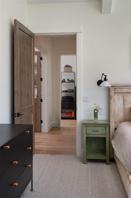 75 Vera Ct, Bozeman, MT 59718 - bedroom with light carpet and light wood-style floors