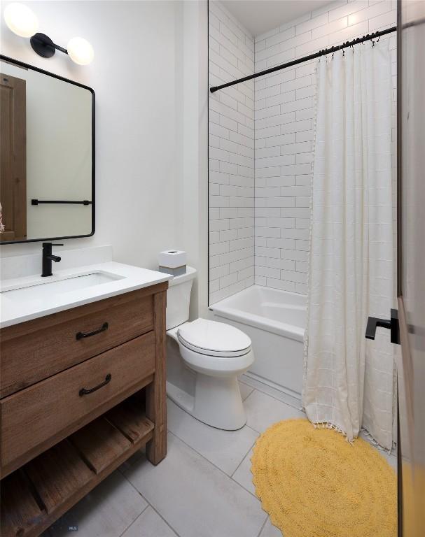 75 Vera Ct, Bozeman, MT 59718 - full bath featuring vanity, shower / bath combo, and tile patterned floors