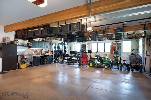 75 Vera Ct, Bozeman, MT 59718 - garage featuring a garage door opener