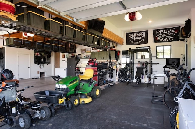 75 Vera Ct, Bozeman, MT 59718 - garage featuring a garage door opener