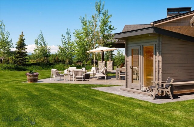 75 Vera Ct, Bozeman, MT 59718 - view of grassy yard with a patio