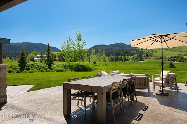 75 Vera Ct, Bozeman, MT 59718 - view of patio / terrace with a mountain view and outdoor dining space