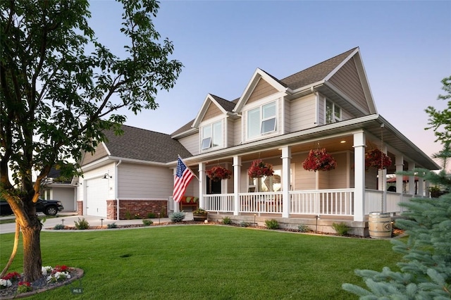 3214 Hillcrest Dr, Bozeman, MT 59715 - view of front of home featuring a porch, an attached garage, a front yard, and roof with shingles