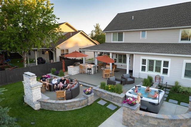 3214 Hillcrest Dr, Bozeman, MT 59715 - rear view of property featuring outdoor lounge area, a patio area, and roof with shingles