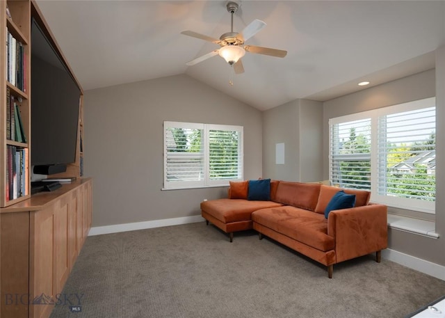 3214 Hillcrest Dr, Bozeman, MT 59715 - living room with healthy amount of natural light, vaulted ceiling, a ceiling fan, and light colored carpet