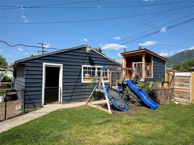2030 Adams Ave, Butte, MT 59701 - rear view of property with a playground