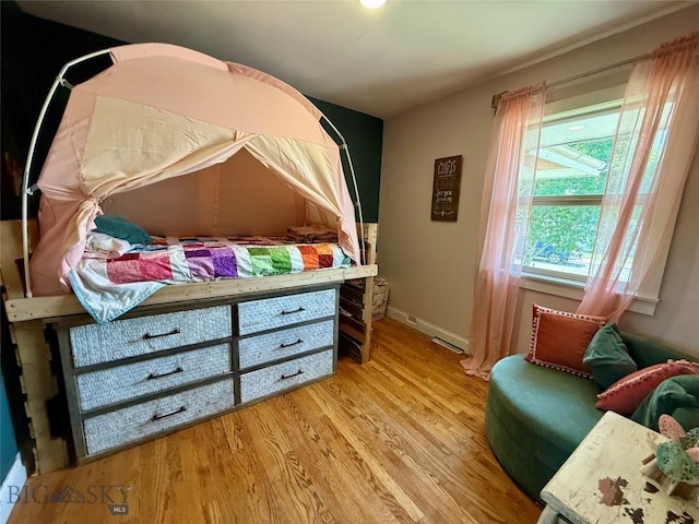 2030 Adams Ave, Butte, MT 59701 - bedroom with light wood finished floors and baseboards