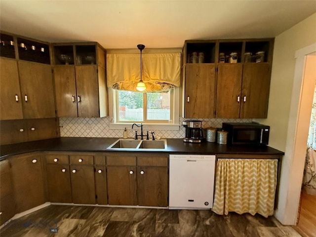 2030 Adams Ave, Butte, MT 59701 - kitchen featuring white dishwasher, black microwave, dark countertops, tasteful backsplash, and open shelves
