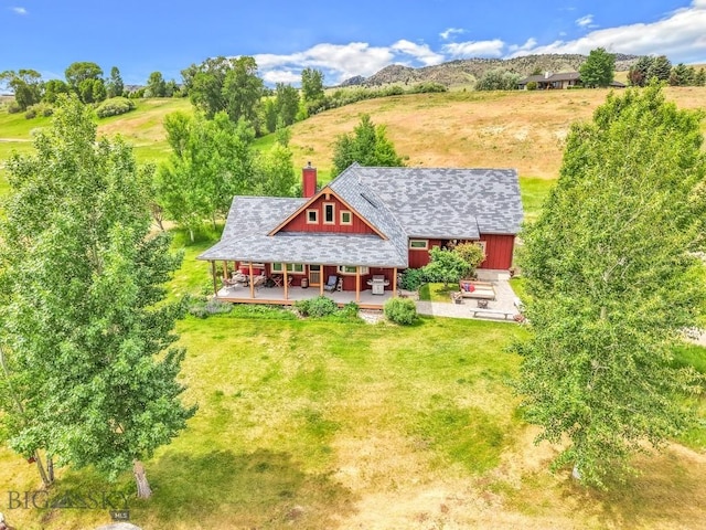 13 Blue Wing Rd, Ennis, MT 59729 - aerial view of property and surrounding area featuring a mountainous background