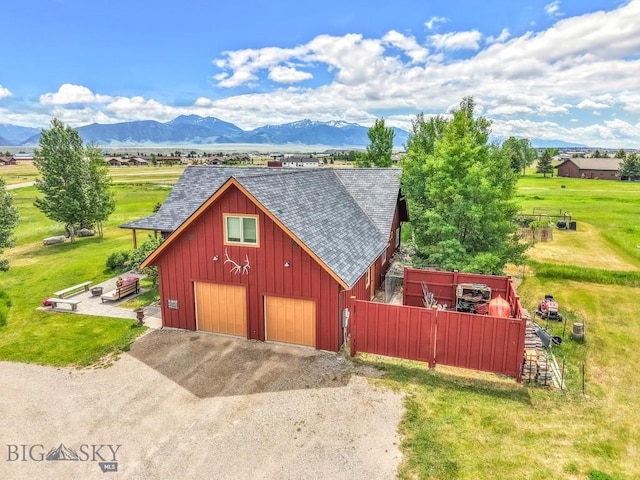 13 Blue Wing Rd, Ennis, MT 59729 - garage with a mountain view, a garage, and driveway