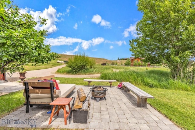 13 Blue Wing Rd, Ennis, MT 59729 - view of patio / terrace featuring an outdoor fire pit