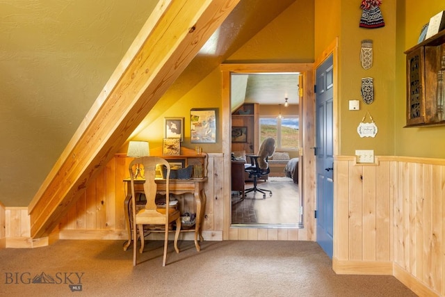 13 Blue Wing Rd, Ennis, MT 59729 - office area with vaulted ceiling, wood walls, carpet, and wainscoting
