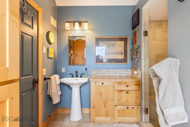 13 Blue Wing Rd, Ennis, MT 59729 - full bath featuring a sink and baseboards