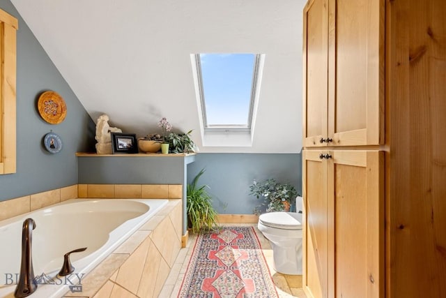 13 Blue Wing Rd, Ennis, MT 59729 - bathroom featuring a skylight, a garden tub, and lofted ceiling