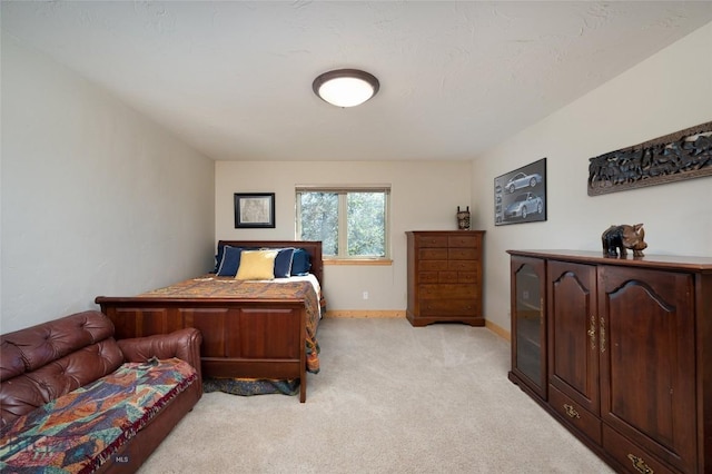 3140 Two Moons Rd, Big Sky, MT 59716 - bedroom featuring light carpet and baseboards