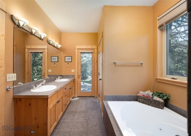 3140 Two Moons Rd, Big Sky, MT 59716 - bathroom with a jetted tub, double vanity, plenty of natural light, and tile patterned flooring