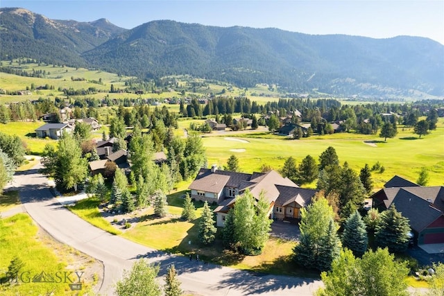 3140 Two Moons Rd, Big Sky, MT 59716 - drone / aerial view of a mountain backdrop and a golf club