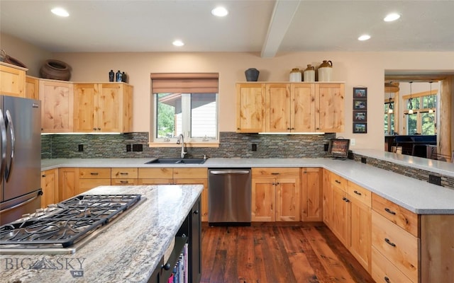 3140 Two Moons Rd, Big Sky, MT 59716 - kitchen featuring appliances with stainless steel finishes, light brown cabinets, dark wood-style floors, healthy amount of natural light, and recessed lighting