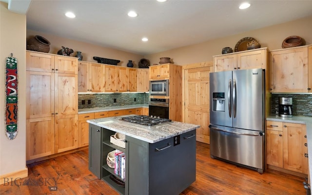 3140 Two Moons Rd, Big Sky, MT 59716 - kitchen featuring stainless steel appliances, light brown cabinetry, tasteful backsplash, dark wood-type flooring, and recessed lighting