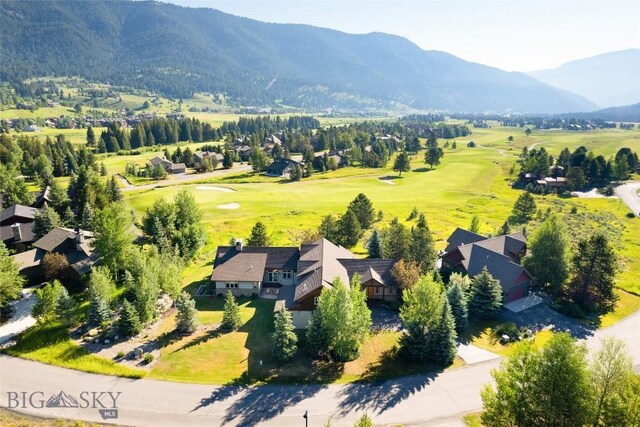 3140 Two Moons Rd, Big Sky, MT 59716 - drone / aerial view of a mountainous background and a golf club