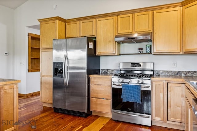 418 May Ln, Belgrade, MT 59714 - kitchen featuring stainless steel appliances, under cabinet range hood, and dark wood-type flooring