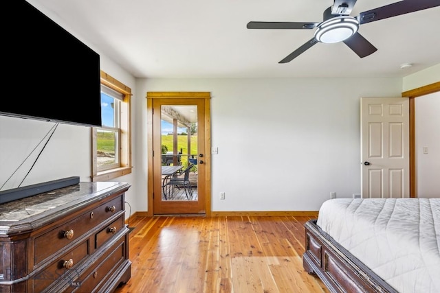 418 May Ln, Belgrade, MT 59714 - bedroom with access to exterior, light wood-type flooring, and ceiling fan