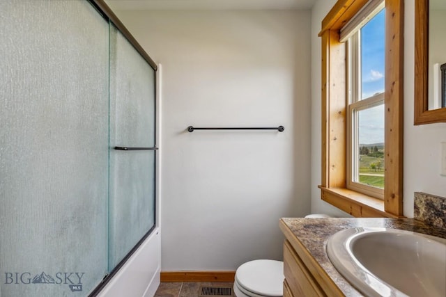 418 May Ln, Belgrade, MT 59714 - bathroom with vanity and enclosed tub / shower combo