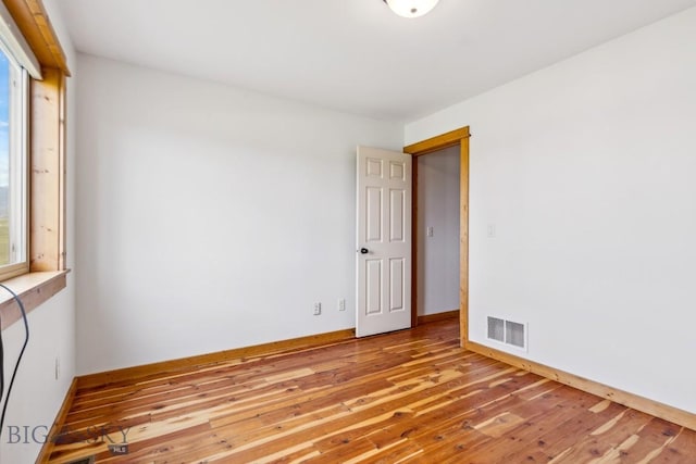 418 May Ln, Belgrade, MT 59714 - unfurnished room featuring light wood-type flooring and baseboards