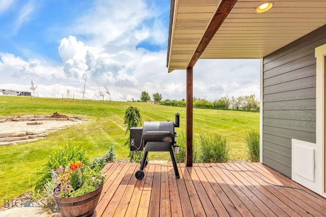 418 May Ln, Belgrade, MT 59714 - wooden deck with a lawn and a rural view