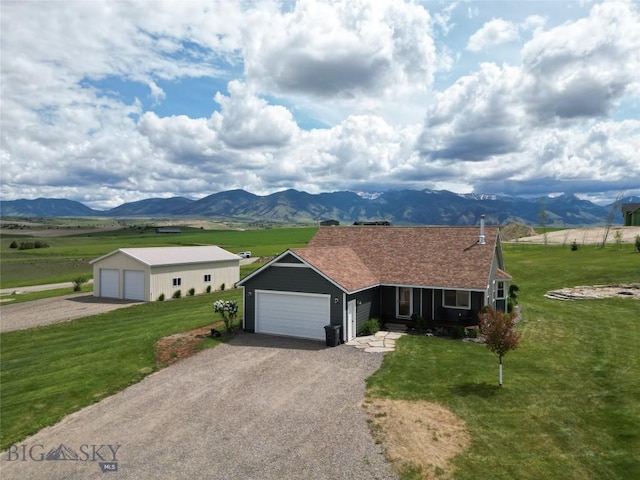 418 May Ln, Belgrade, MT 59714 - single story home featuring a front lawn and a mountain view