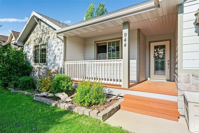 944 Forest Glen Dr, Bozeman, MT 59718 - view of exterior entry featuring covered porch and stone siding