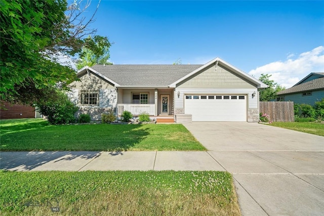 944 Forest Glen Dr, Bozeman, MT 59718 - ranch-style home featuring a porch, a garage, stone siding, and concrete driveway