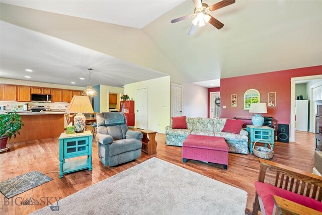 944 Forest Glen Dr, Bozeman, MT 59718 - living room with light wood-style floors, recessed lighting, ceiling fan, and high vaulted ceiling