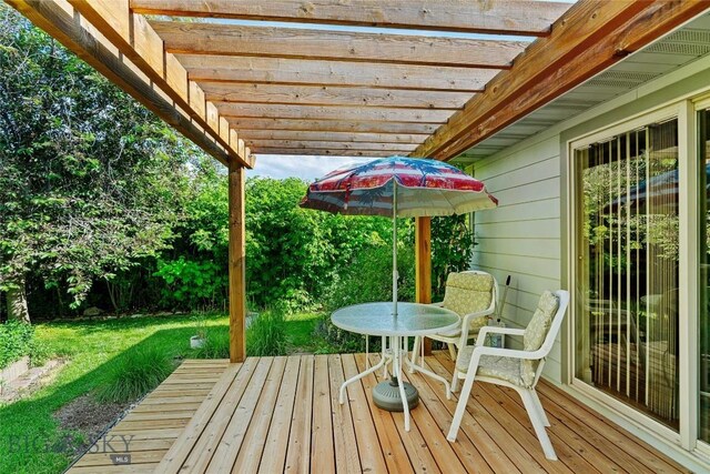 944 Forest Glen Dr, Bozeman, MT 59718 - wooden deck featuring a pergola and a yard