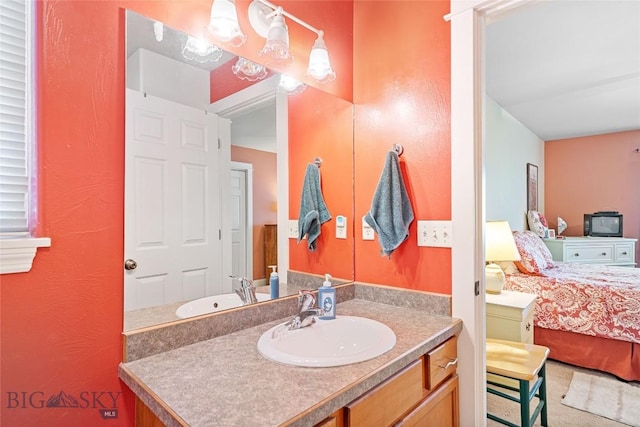 944 Forest Glen Dr, Bozeman, MT 59718 - bathroom featuring vanity and connected bathroom