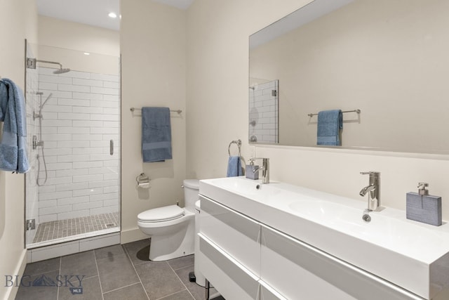 544 Grey Drake, Big Sky, MT 59716 - bathroom featuring a stall shower, double vanity, tile patterned flooring, and recessed lighting