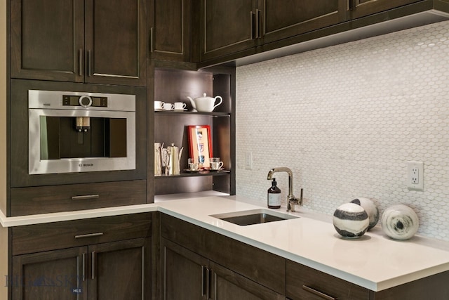 544 Grey Drake, Big Sky, MT 59716 - bar area featuring oven and decorative backsplash