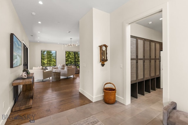 544 Grey Drake, Big Sky, MT 59716 - hall with recessed lighting and a chandelier