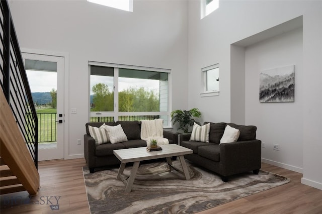 1942 Southbridge Unit B, Bozeman, MT 59718 - living area with a high ceiling and wood finished floors